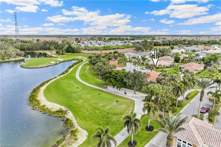 Aerial view of property loaction featuring a water view