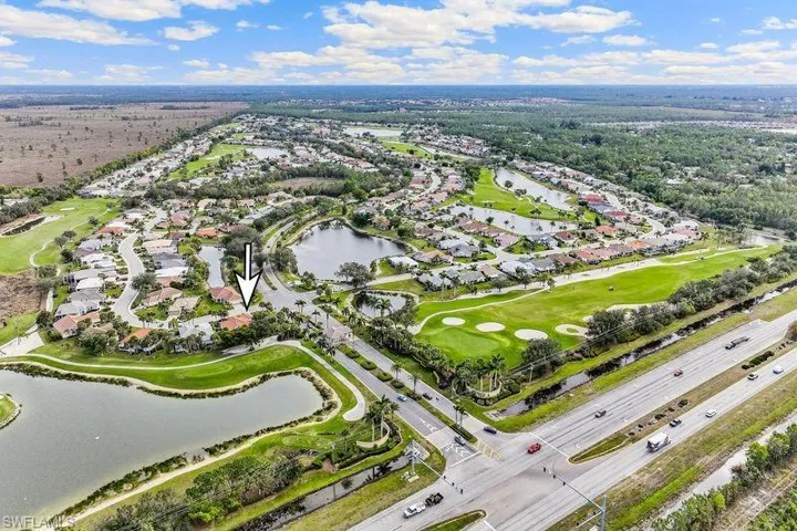 Bird's eye view with a water view of community