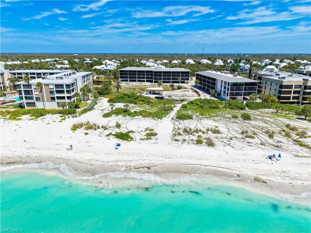 Coastal property with direct access to a white sand beach and turquoise waters