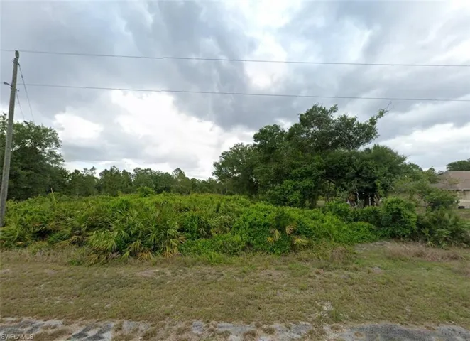 1612  Fifth  AVE, Lehigh Acres, FL 33972