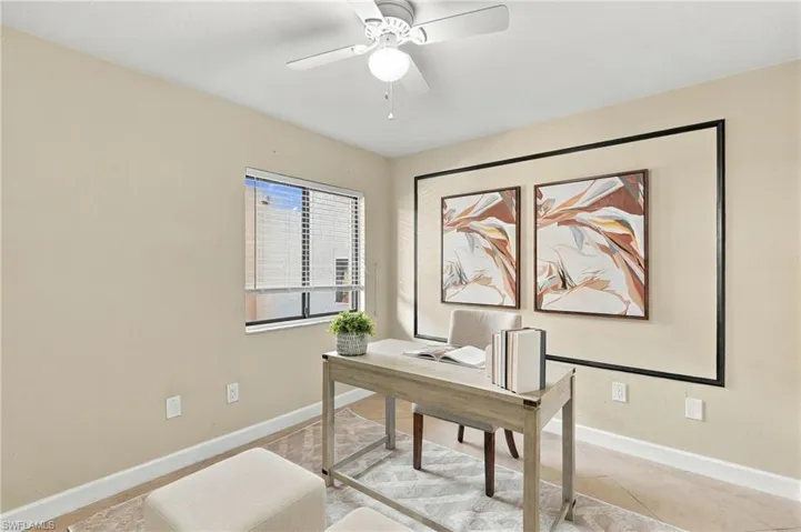 Neutral-toned room featuring a central ceiling fan with an integrated light fixture, horizontal window blinds, and decorative wall molding