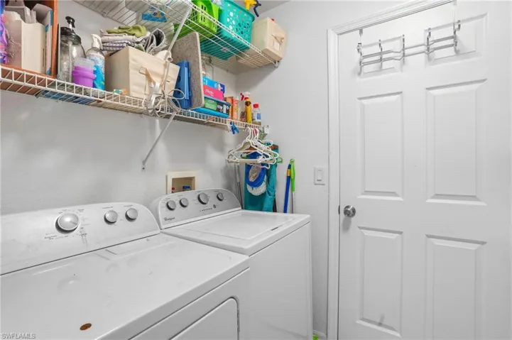Laundry area featuring separate washer and dryer