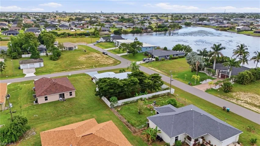 Aerial view of residential area with a nearby body of water