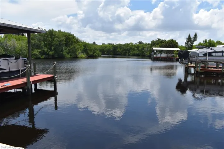 Rear view of water behind property