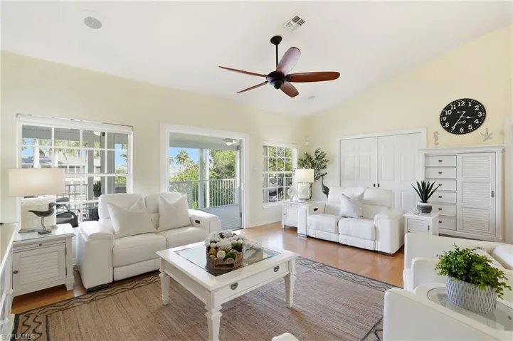 Living Area featuring sliding Pocket Doors for easy access to Guest Bedroom/Office