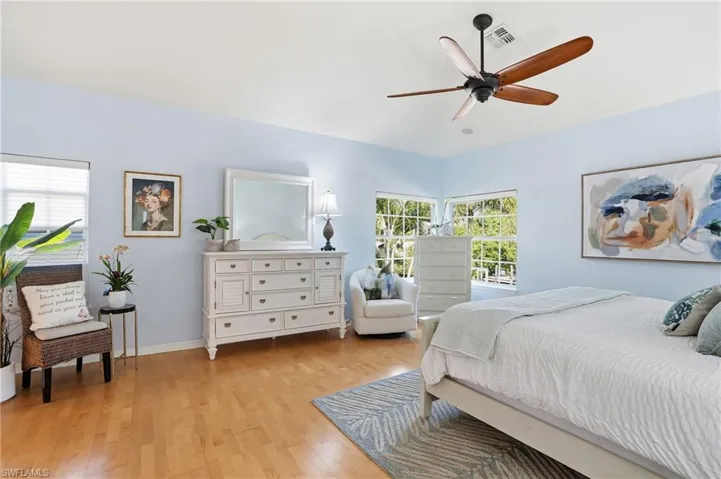 Primary Suite featuring Hardwood Flooring