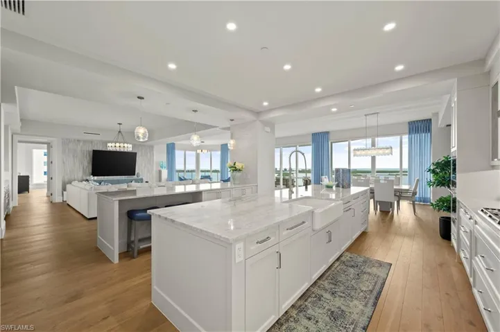 Volume ceilings, custom window treatments, wood flooring - the finishes are spectacular!