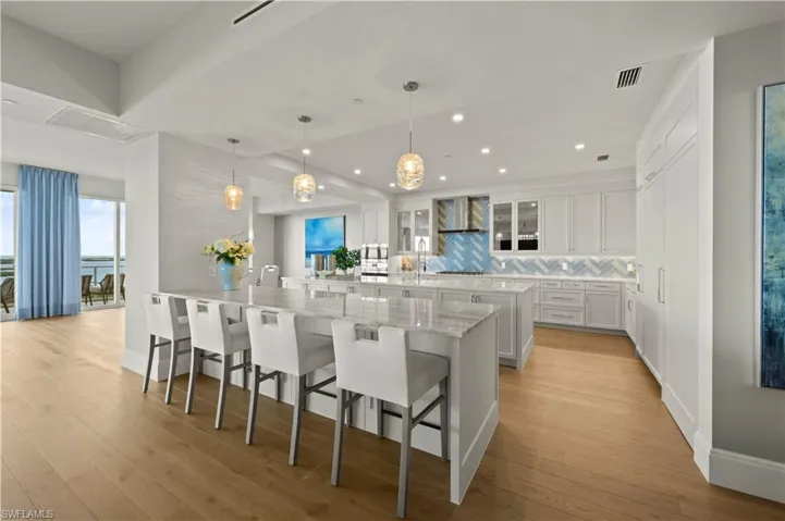 Two kitchen islands designed to make entertaining effortless.