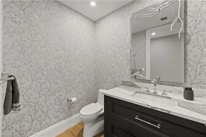 Guest bathroom, off the foyer.