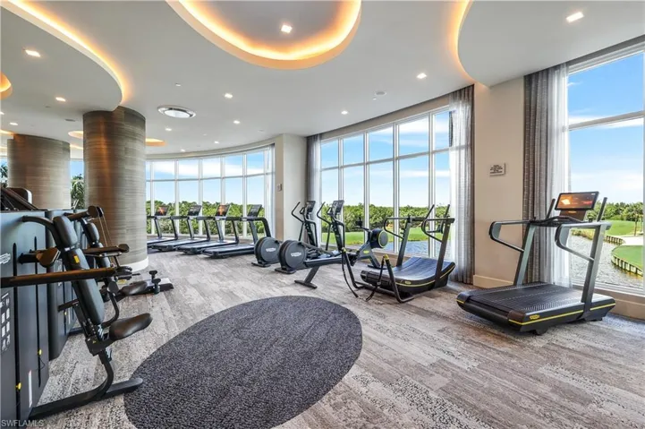 Even the building's fitness center enjoys a lovely view.