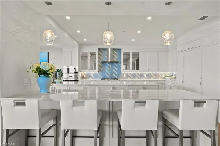 Quartz countertops, high end appliances and plenty of prep space make this kitchen a chef's paradise.