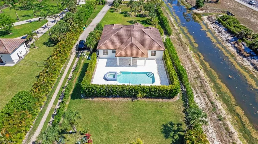 View of subject property with a nearby body of water