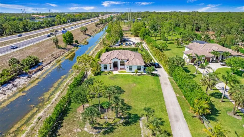 View of subject property featuring a nearby body of water