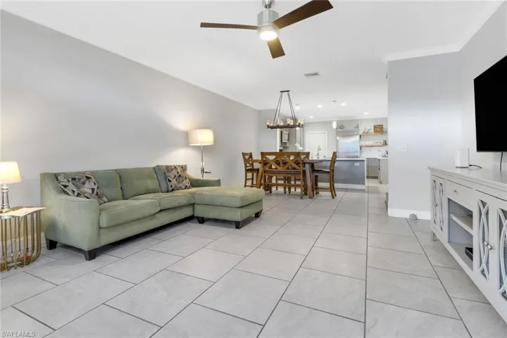 Spacious Open Concept Living and Dining Area that overlooks the gorgeous kitchen