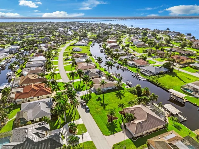 Aerial view of residential area with a large body of water