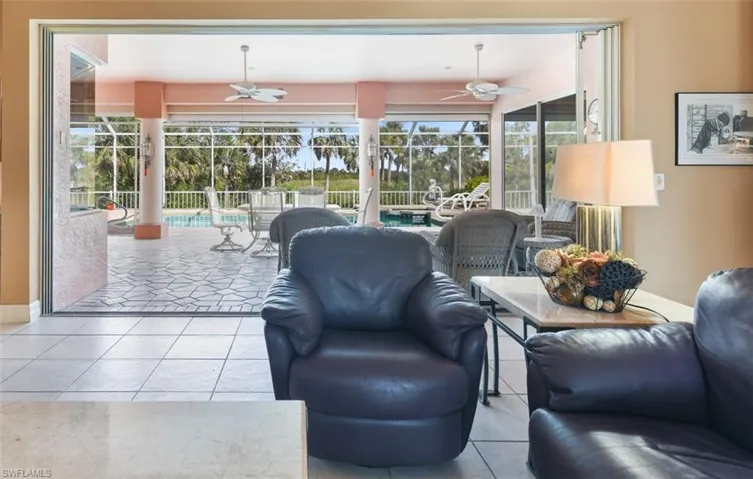 Living room opens fully to the lanai