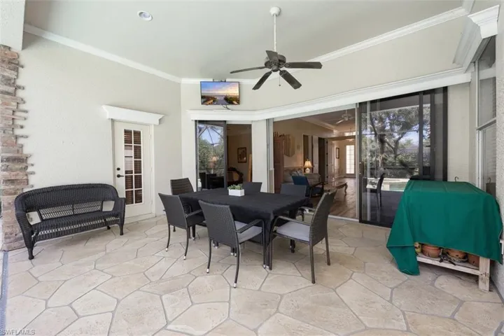 View of patio / terrace featuring a ceiling fan and outdoor dining area