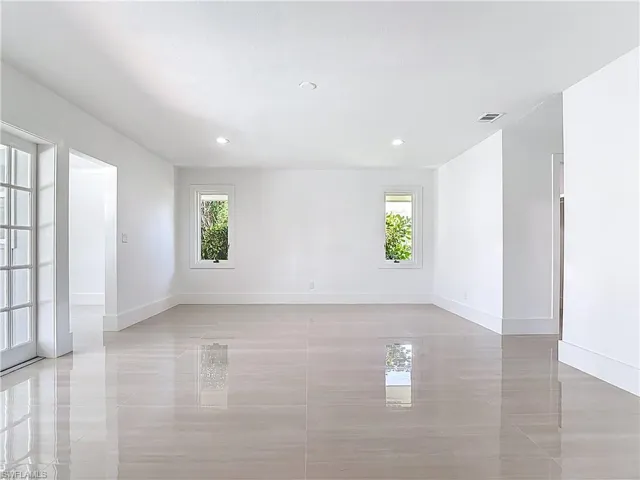 Unfurnished room featuring recessed lighting