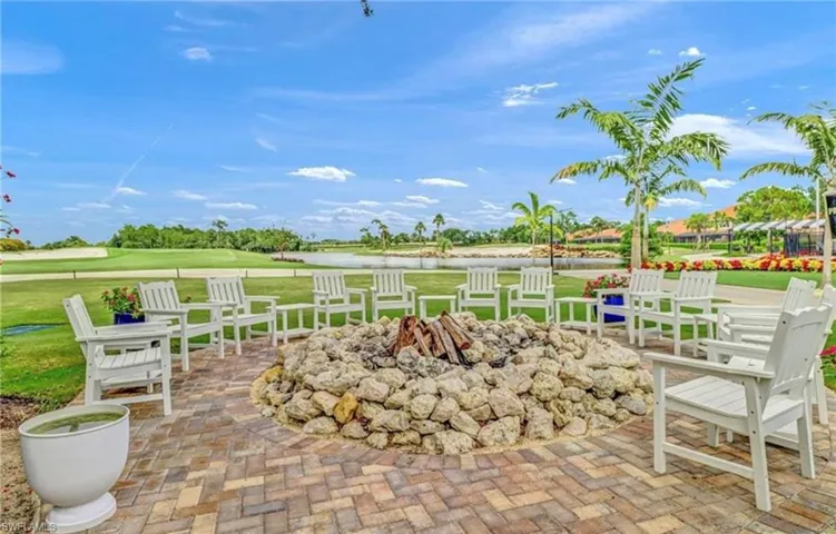 View of patio featuring a fire pit