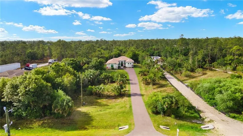 Bird's eye view with a wooded view
