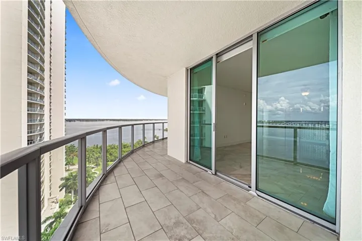 Tiled Lanai off Living Room w/Water Views!