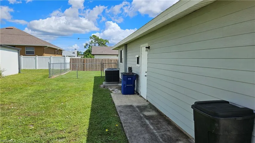 View of fenced backyard