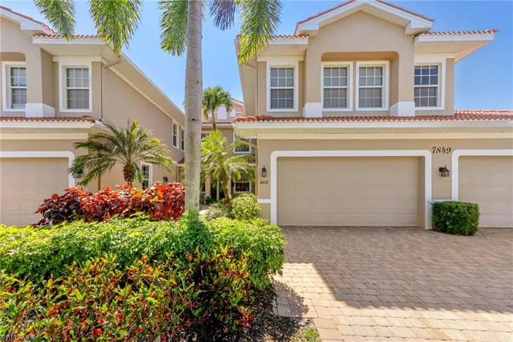 Mediterranean / Spanish-style home with a double garage