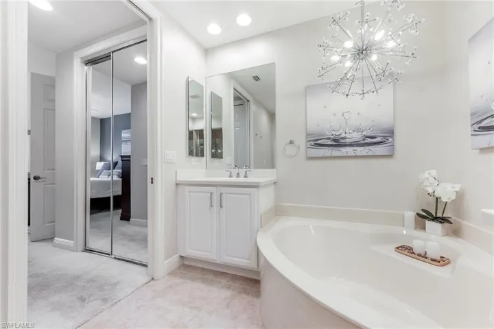 Bathroom with a bathtub and vanity