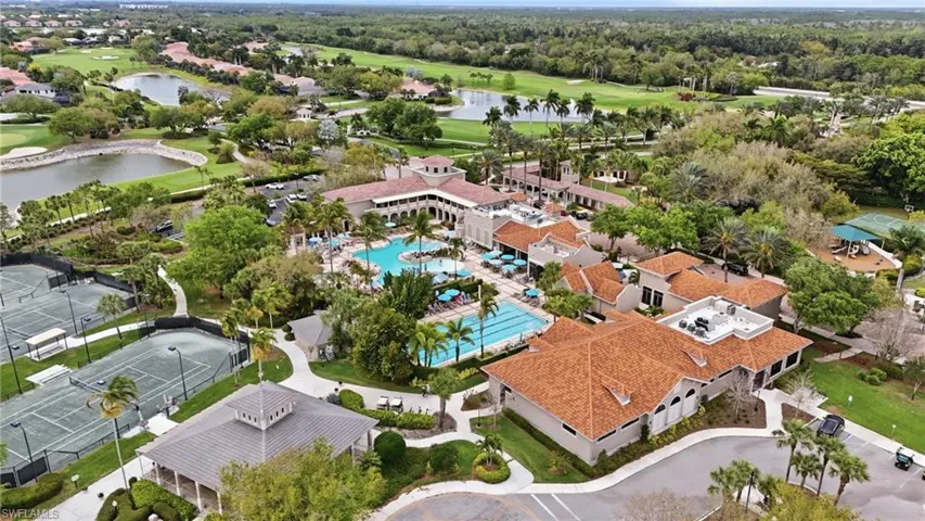 Drone / aerial view of a golf club and a large body of water