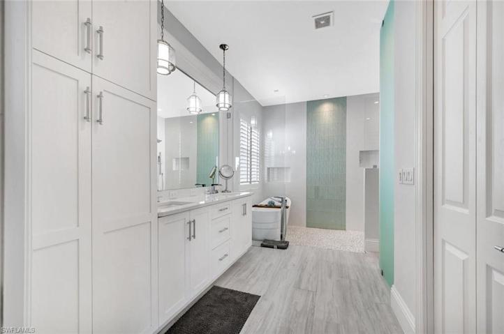 Custom Cabinets, Double Sinks and  Large Walk in Closet