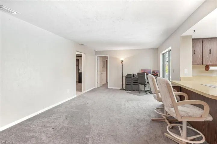Office area featuring carpet flooring