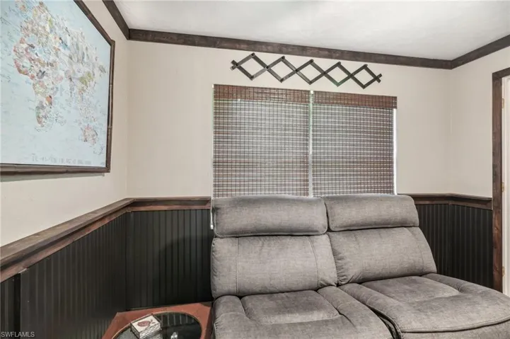 Sitting room featuring ornamental molding