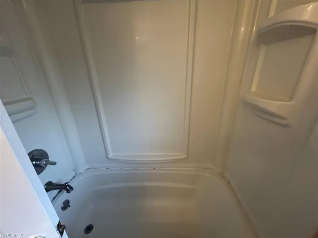 Bathroom featuring shower / bath combination