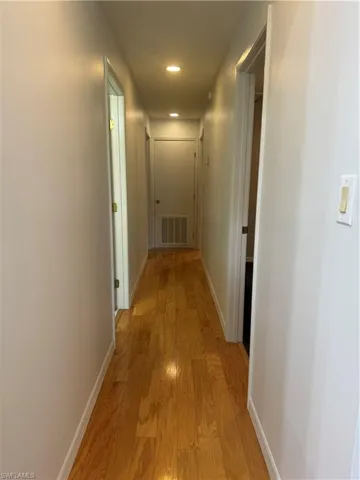 Hall featuring light hardwood / wood-style floors