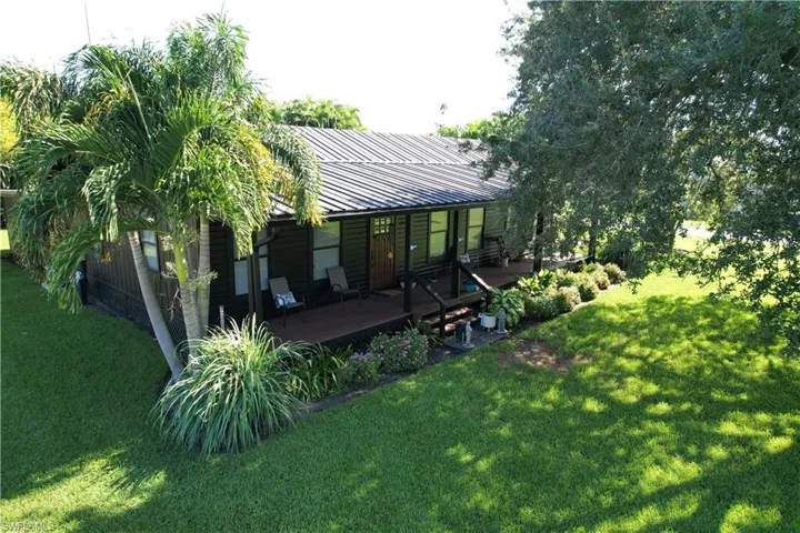 View of yard featuring a deck