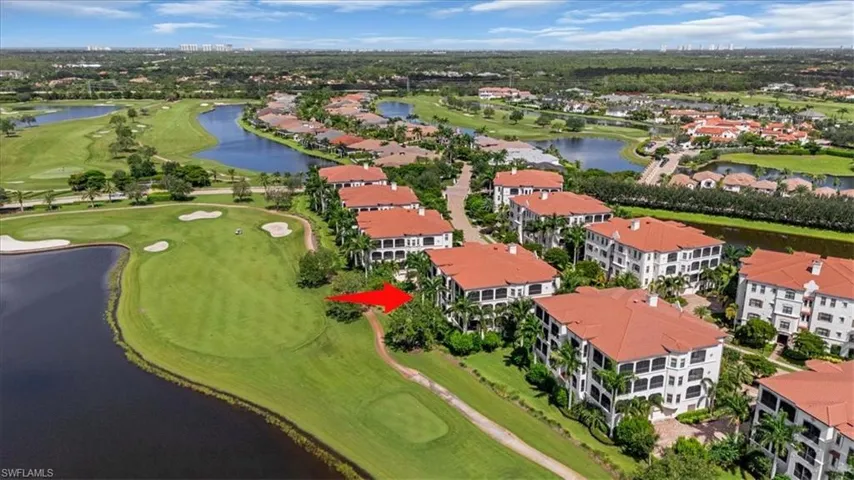 Aerial view of a local golf course and a large body of water