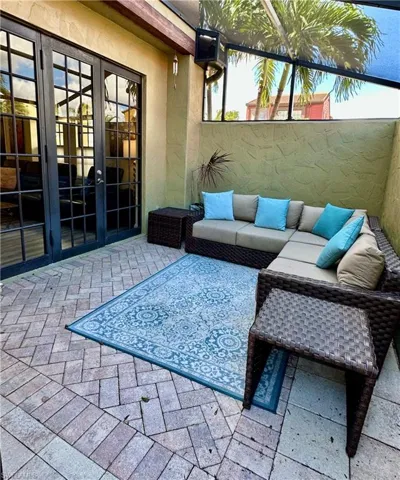 View of patio featuring an outdoor hangout area and french doors