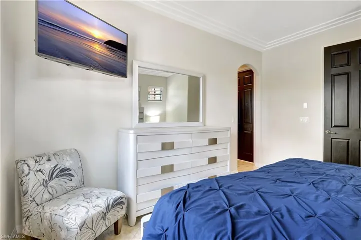 Bedroom with crown molding