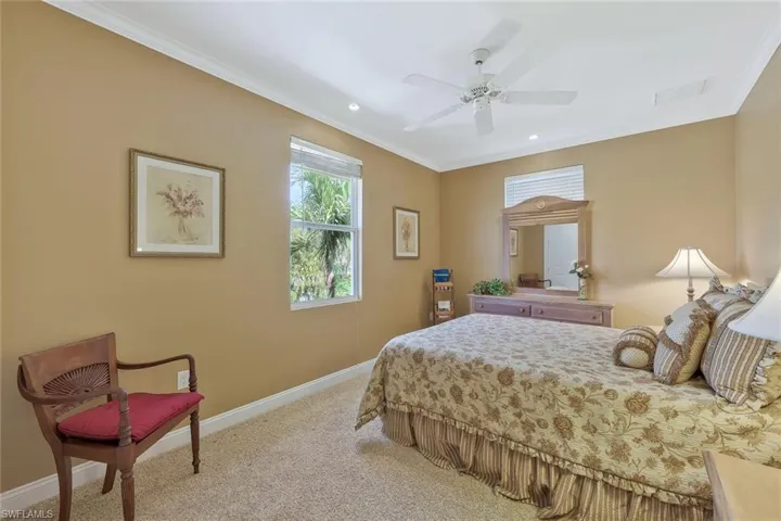 Second guest bedroom with plenty of natural light.