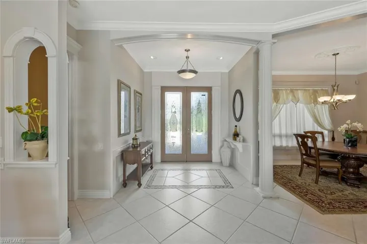 Elegant foyer with high ceilings and an inviting open layout.