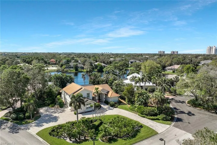 Aerial view showcasing the stunning property and its lush surroundings.