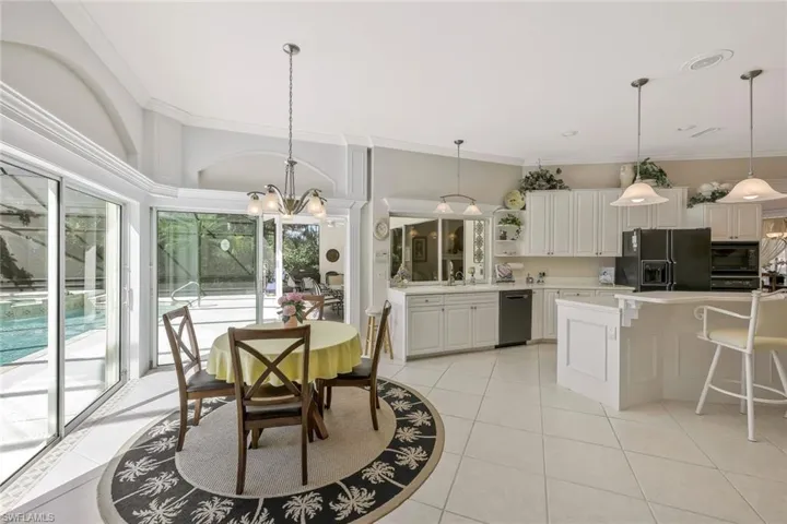 Casual dining area with SO MUCH natural light.
