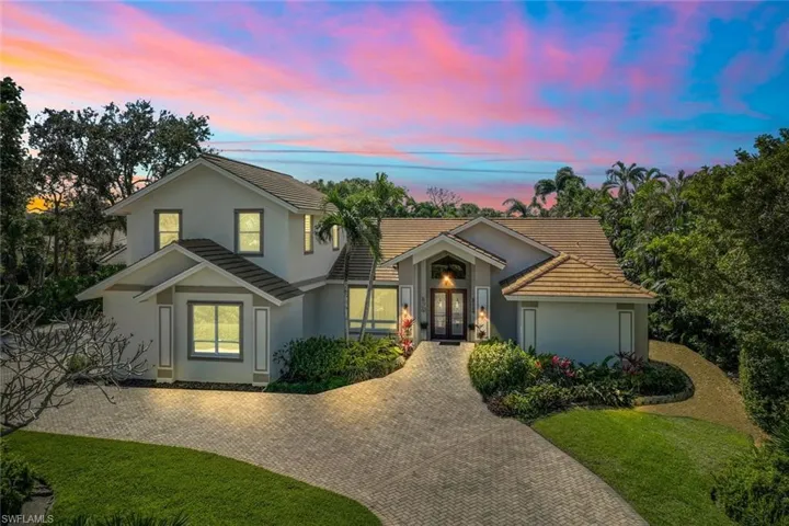 Stroll through the  neighborhood of Woodlake at sunset and be mesmerized by the colorful sky and lovely landscape.