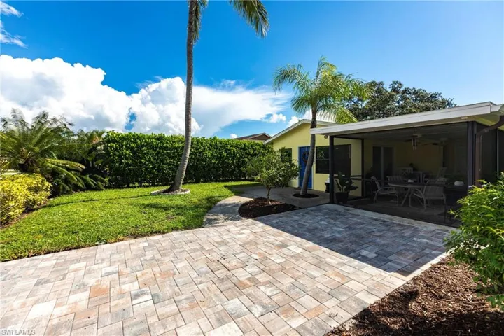 View of patio with a ceiling fan