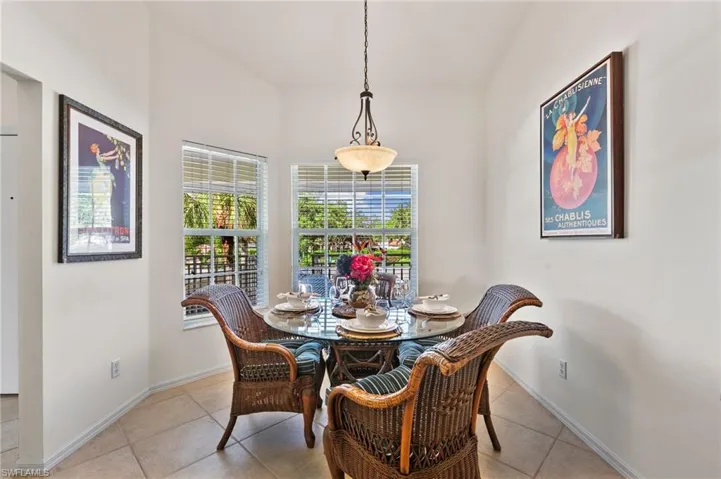 Dining area featuring light tile floors
