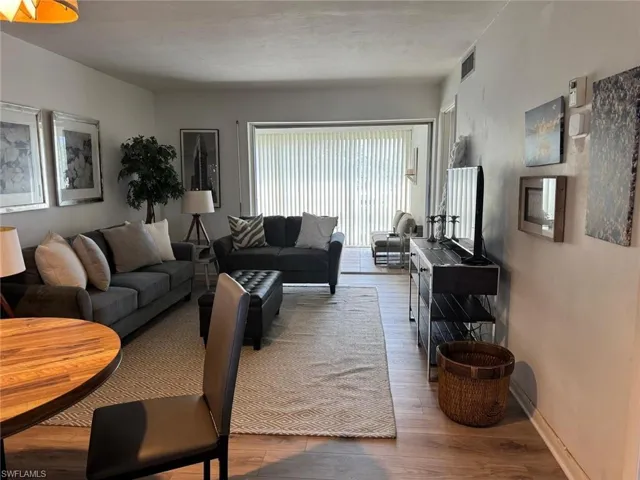 Living room featuring hardwood / wood-style floors