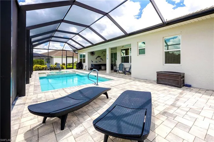 View of pool featuring a lanai and a patio