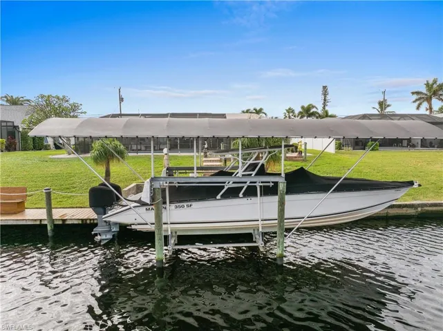 View of dock with a water view 10K lbs Boat lift