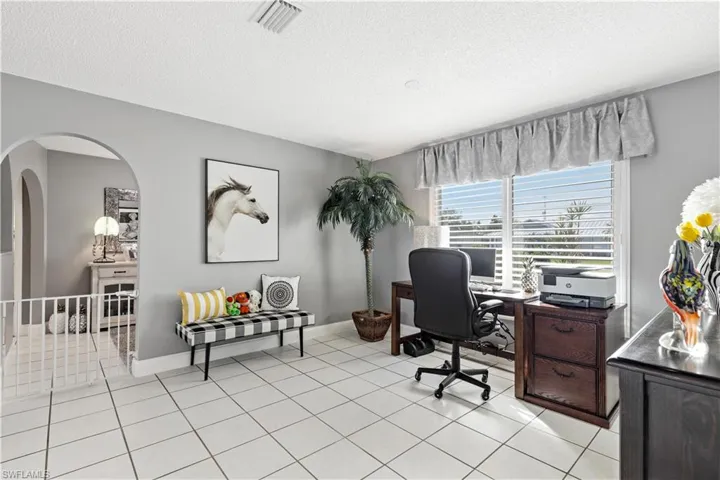 Tiled dining room used as office