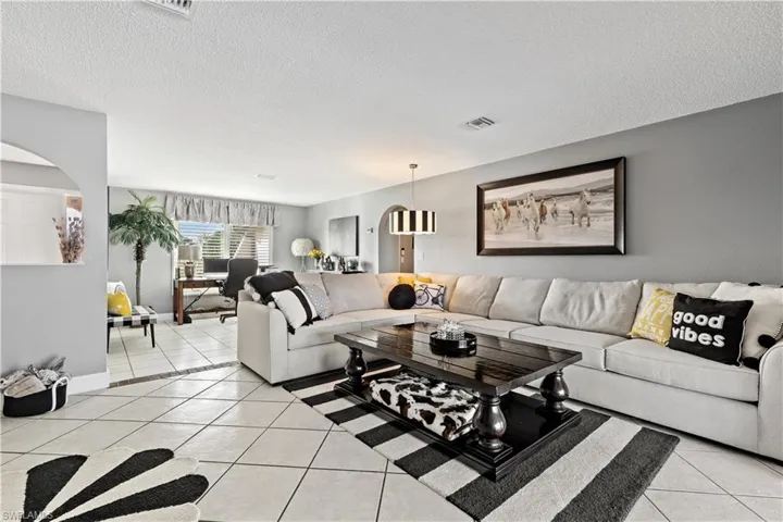 Living room featuring light tile patterned flooring